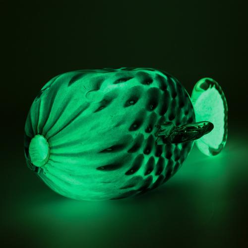 Glowing glass fish sculpture