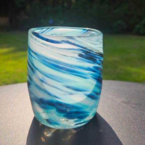 Glass with blue and white swirls