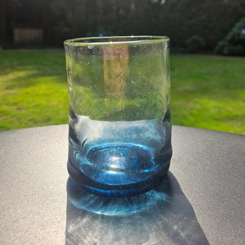 Glass with blue bottom and transparent top